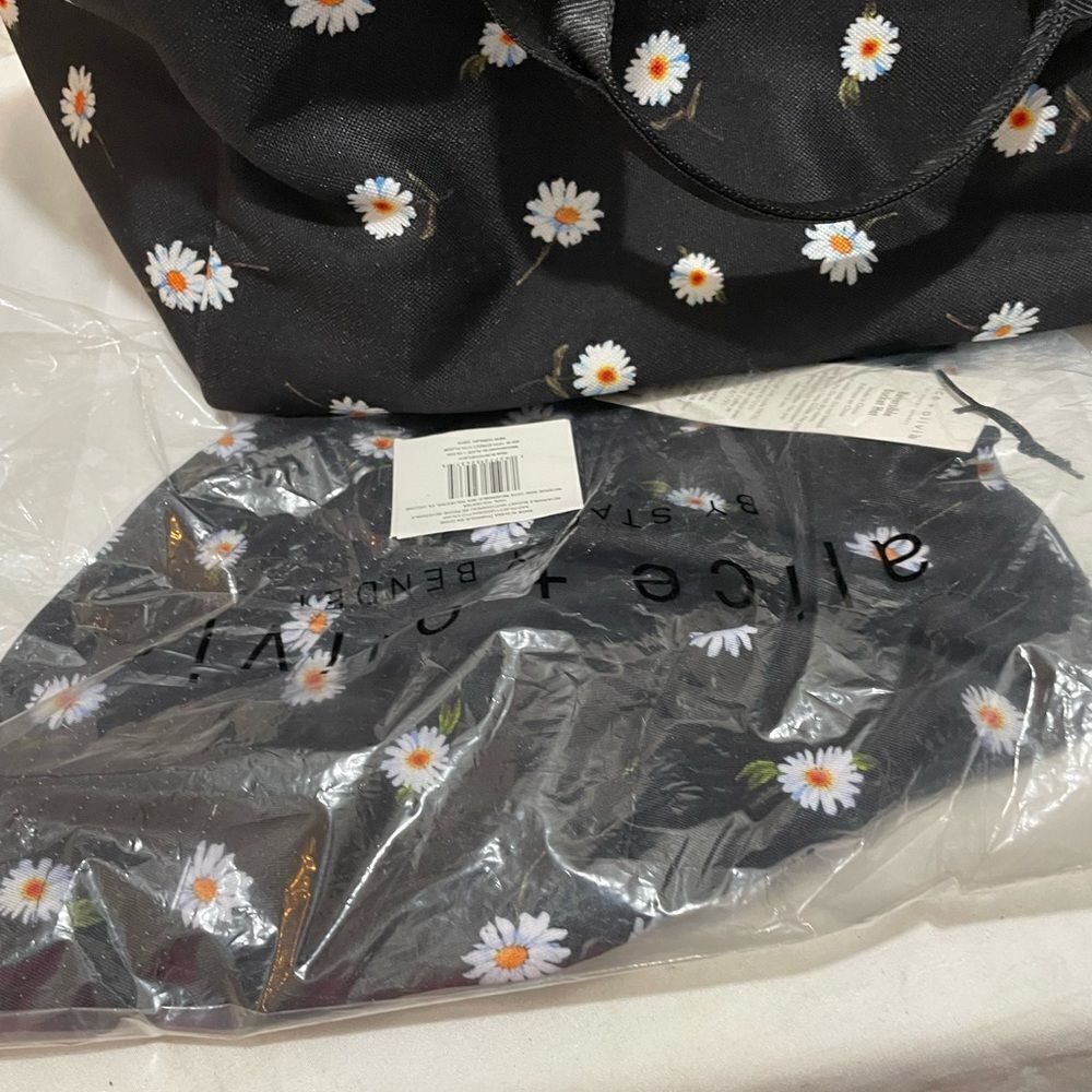 Alice + Olivia Black Daisy Print Duffle Bag & A+O Matching Reversible Bucket Hat